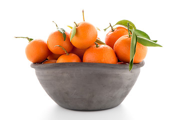 Image showing Tangerines on clay bowl 