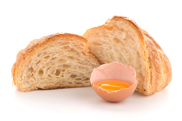 Image showing Croissant and raw egg