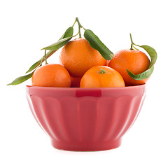 Image showing Tangerines on ceramic red bowl 