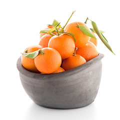 Image showing Tangerines on clay bowl 