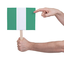 Image showing Hand holding small card - Flag of Nigeria