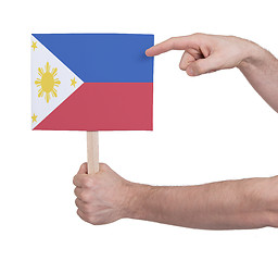 Image showing Hand holding small card - Flag of Philipines