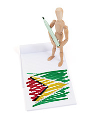 Image showing Wooden mannequin made a drawing - Guyana