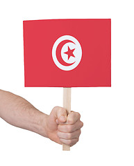 Image showing Hand holding small card - Flag of Tunisia