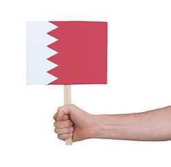 Image showing Hand holding small card - Flag of Bahrain