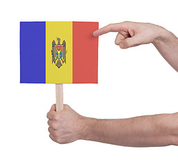Image showing Hand holding small card - Flag of Moldova