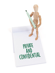 Image showing Wooden mannequin writing - Private and confidential