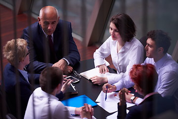 Image showing business people group on meeting at modern bright office