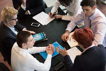 Image showing business people group on meeting at modern bright office