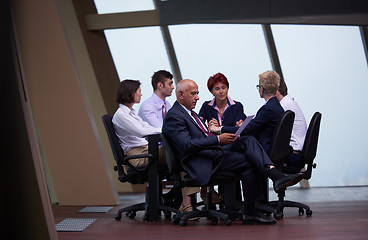 Image showing business people group on meeting at modern bright office