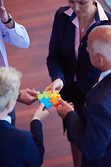 Image showing assembling jigsaw puzzle