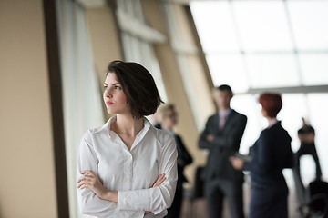 Image showing business people group, woman in front  as team leader