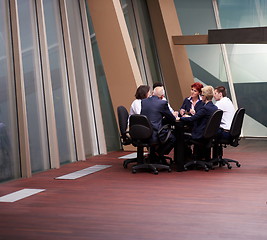 Image showing business people group on meeting at modern bright office