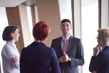 Image showing business people group on meeting at modern bright office