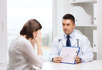 Image showing doctor and young woman meeting at hospital