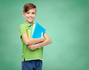 Image showing happy student boy with folders and notebooks