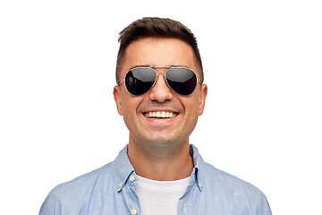 Image showing face of smiling man in shirt and sunglasses