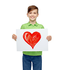 Image showing happy boy holding drawing or picture of red heart