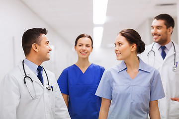 Image showing happy group of medics or doctors at hospital