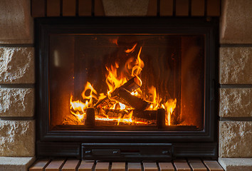 Image showing close up of burning fireplace at home