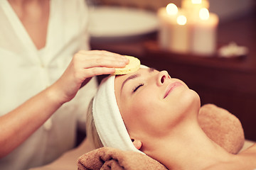 Image showing close up of woman having face cleaning in spa