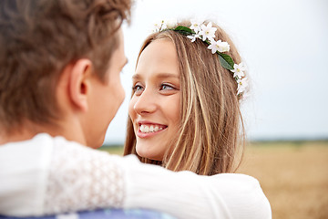 Image showing happy smiling young hippie couple outdoors