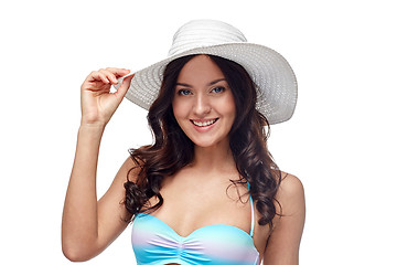 Image showing happy young woman in bikini swimsuit and sun hat