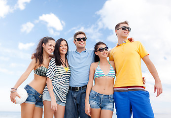 Image showing group of happy friends with beach ball