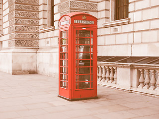 Image showing Retro looking Red phone box in London