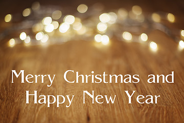 Image showing Wooden table Merry Christmas Happy New Year