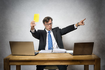 Image showing Business man with yellow card