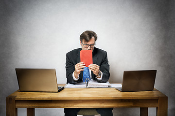 Image showing business man with red card