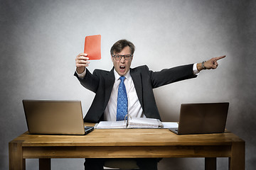 Image showing Angry business man with red card