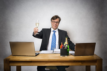 Image showing Business man with champagne glass