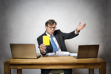 Image showing Business man with yellow card