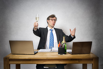 Image showing Business man with champagne glass