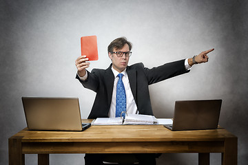 Image showing Angry business man with red card