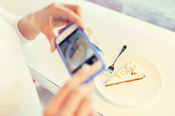 Image showing woman hands with smartphone taking food picture