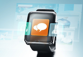 Image showing close up of black smart watch with messenger icon