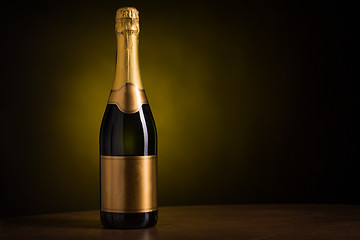 Image showing bottle of champagne with blank golden label