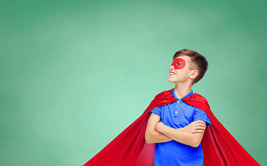 Image showing boy in red super hero cape and mask