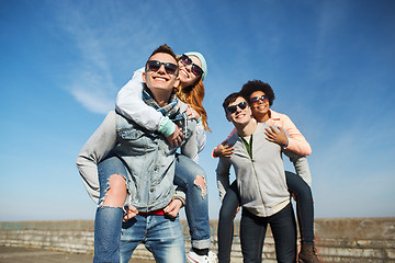 Image showing happy friends in shades having fun outdoors