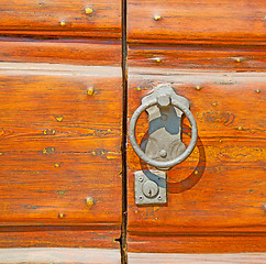 Image showing europe old in  italy  antique close brown door and rusty lock  c