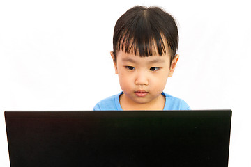 Image showing Chinese little girl using laptop