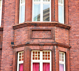 Image showing in europe london old red brick wall and      historical window