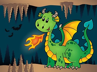 Image showing Cave with green happy dragon