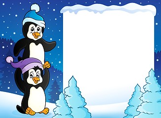 Image showing Snowy frame with penguins