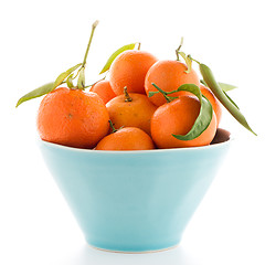 Image showing Tangerines on ceramic blue bowl 