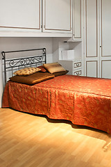 Image showing Vintage red bed