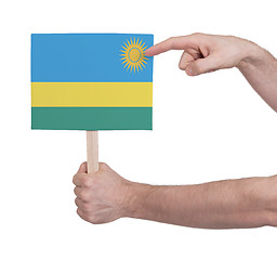 Image showing Hand holding small card - Flag of Rwanda